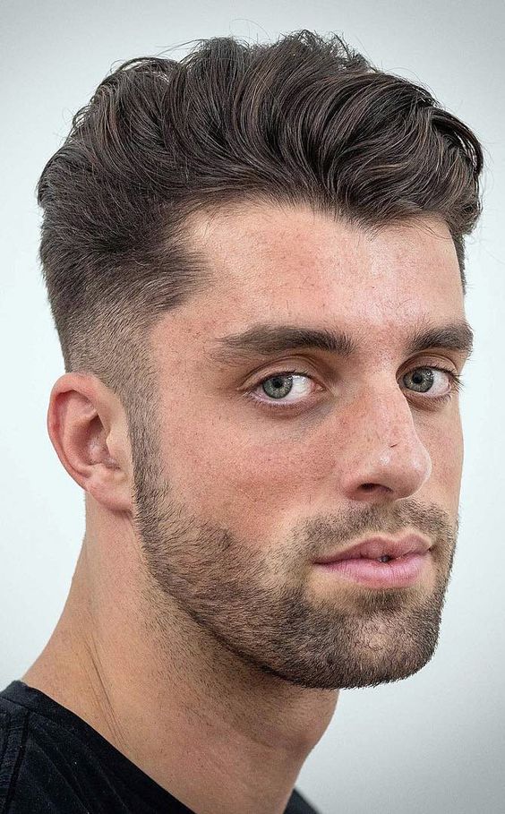 Mid Fade with a Lightly Sculpted Medium Beard