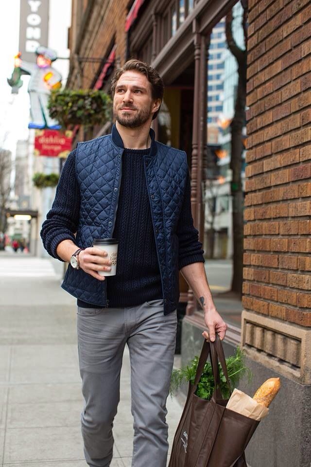 Cable knit sweater, quilted vest and corduroy trousers