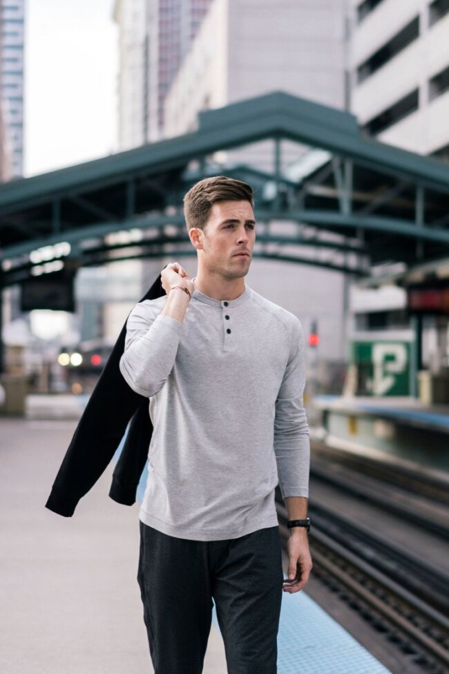 Fleece jacket with henley shirt and dark jeans