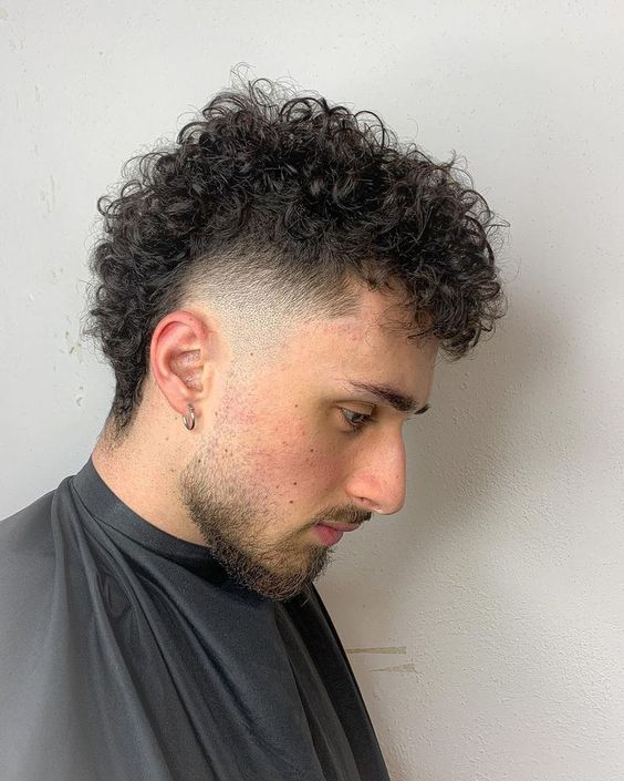 Smooth Faux Hawk with Low Fade